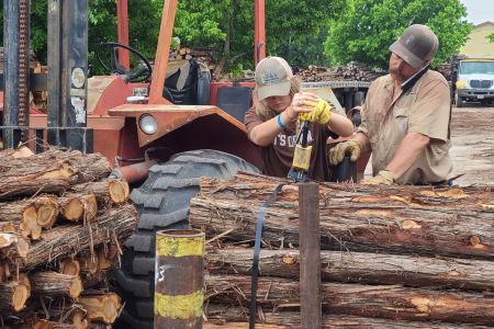 Tye and Kyna bundling posts for a load