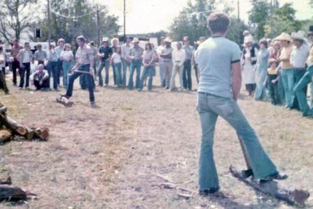 Jerry in the distance competing in the "Cedar Chopping World Championship"