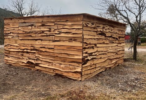 We used live edge slabs to create a beautiful livestock shelter for our client.