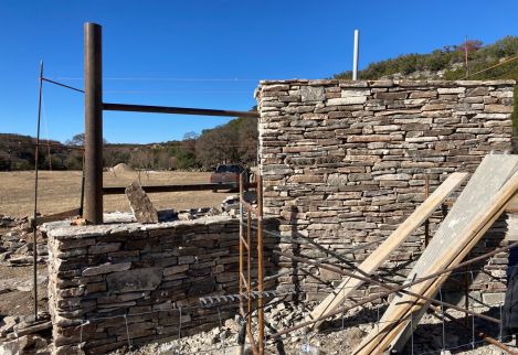 Dry Stacked Rock with pipe frame, soon to be finished with cedar accents.