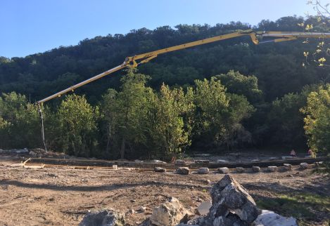 Using our team of subcontractors, we designed, formed, and poured this concrete crossing using native boulders to blend in to the environment.